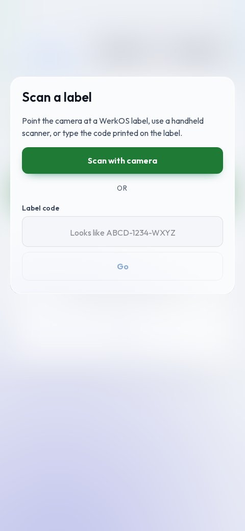 WerkOS shop-floor screen for scanning a job label with a phone camera or handheld scanner